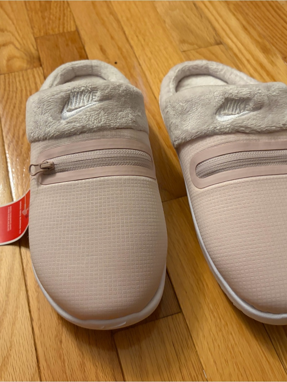 Nike Women's Blush Pink Slip-On Cozy Clog slippers with Zipper pocket